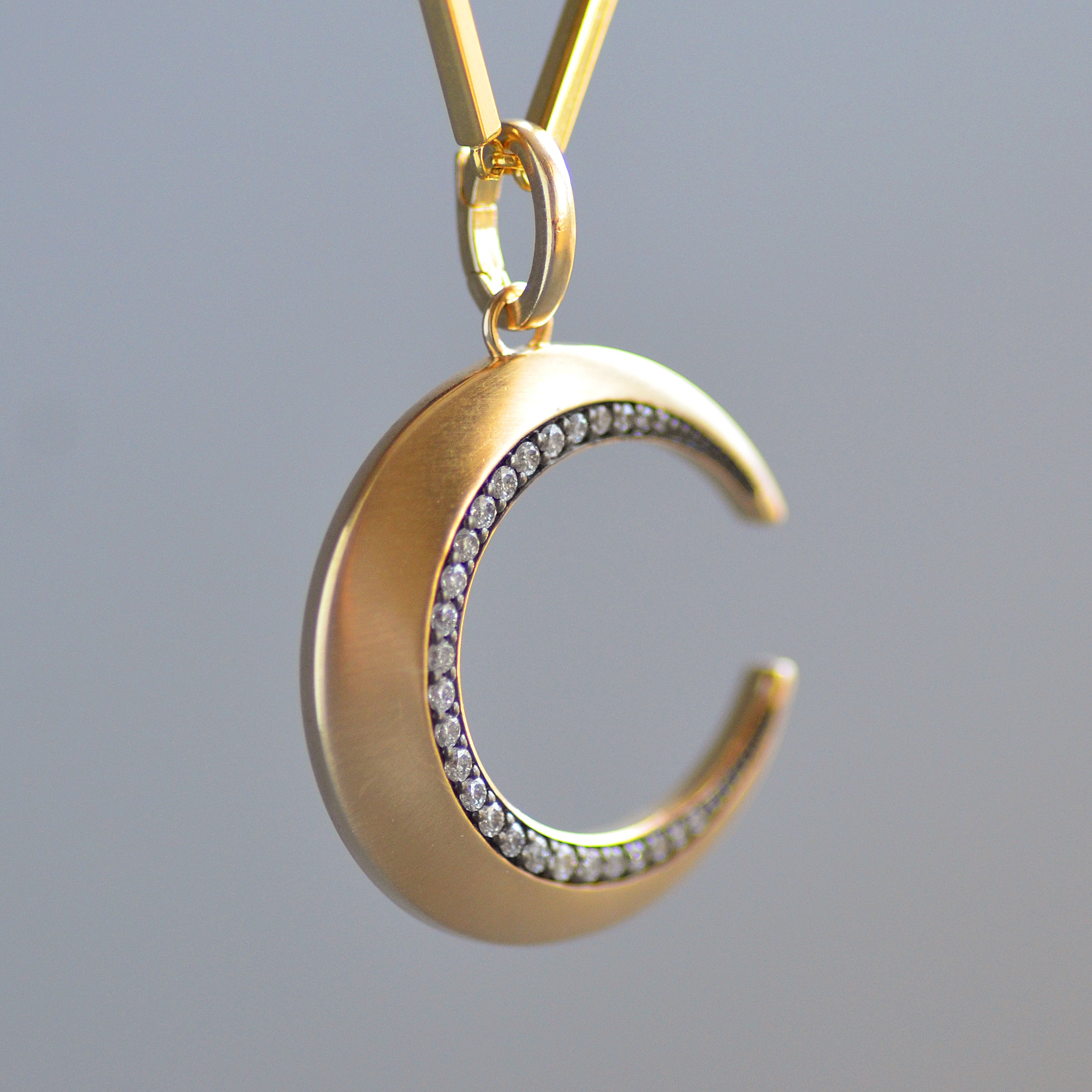 Crescent pendant