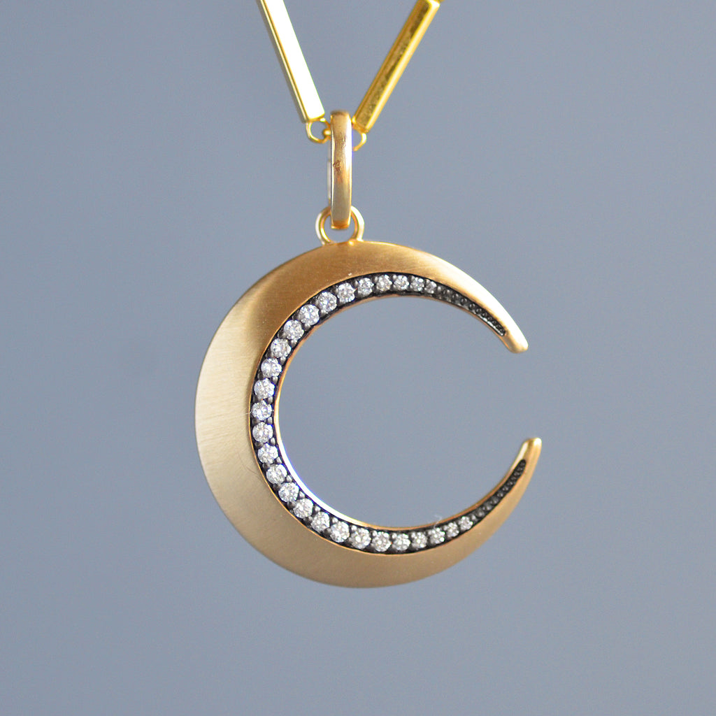 Crescent pendant