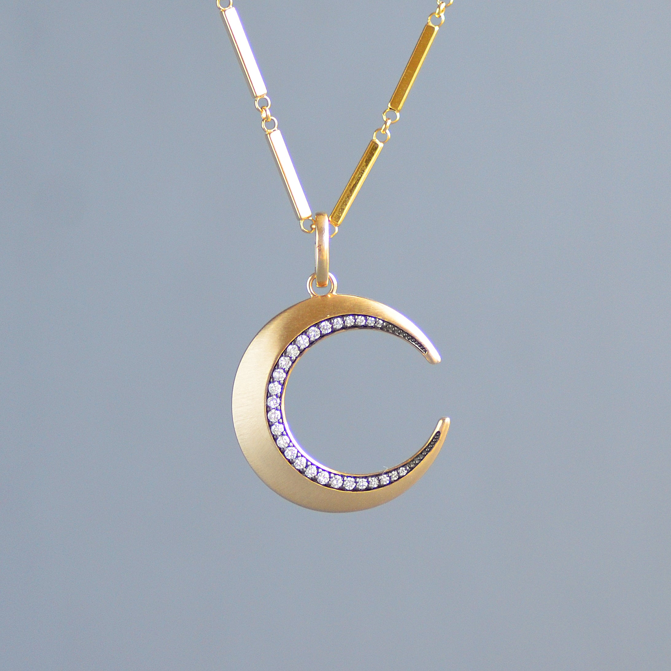 Crescent pendant
