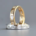 Wide emerald cut eternity band