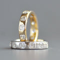 Wide asscher cut eternity band