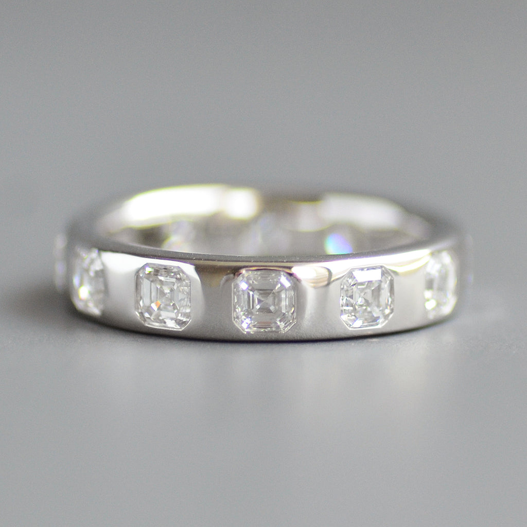 Wide asscher cut eternity band