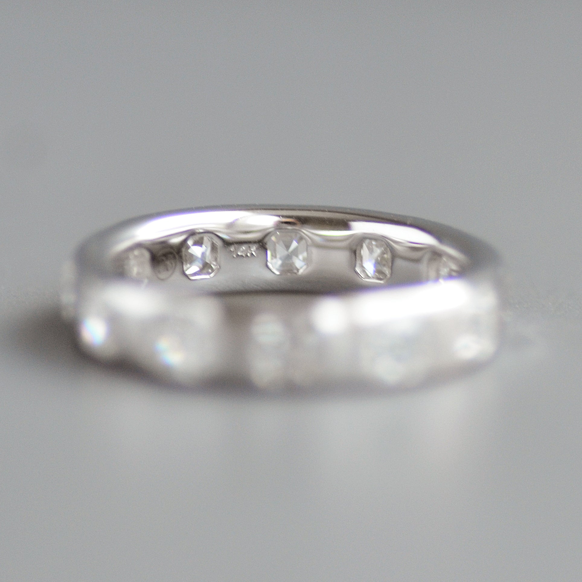 Wide asscher cut eternity band