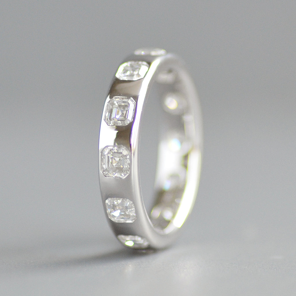 Wide asscher cut eternity band