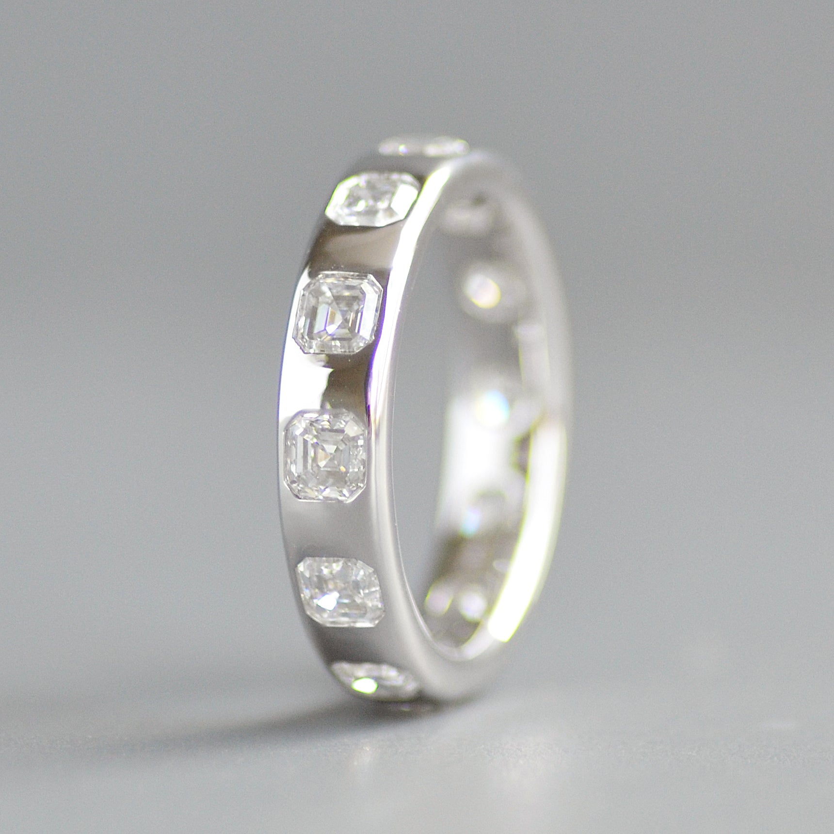 Wide asscher cut eternity band