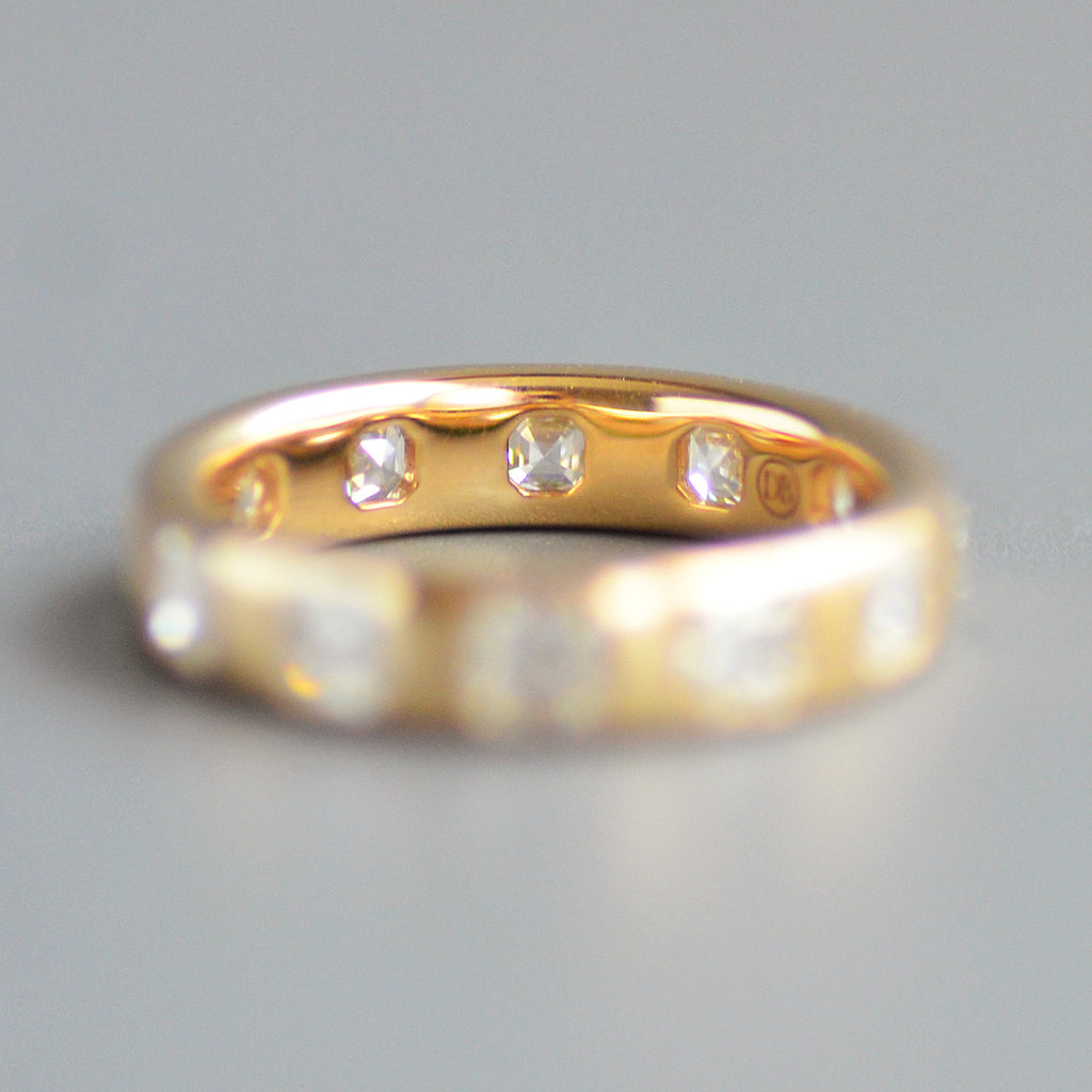Wide asscher cut eternity band