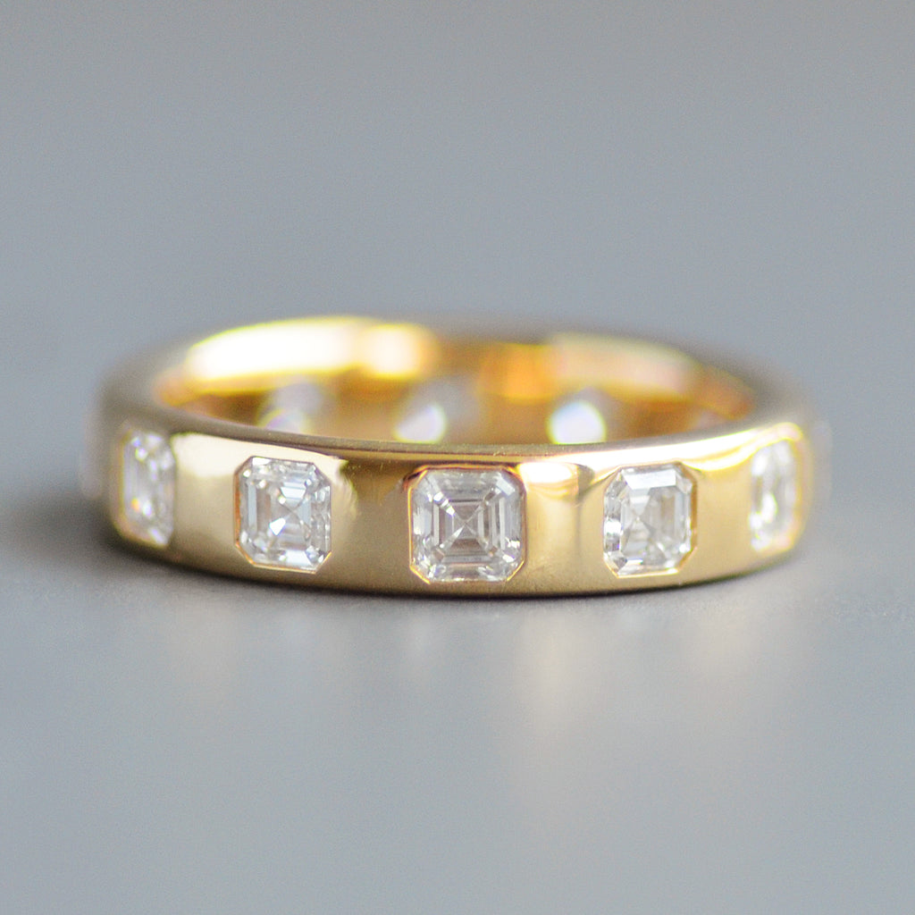 Wide asscher cut eternity band
