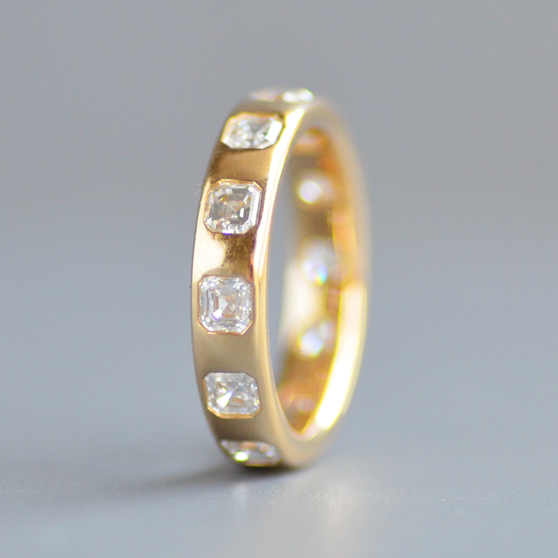 Wide asscher cut eternity band