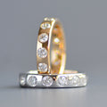 Wide round cut eternity band