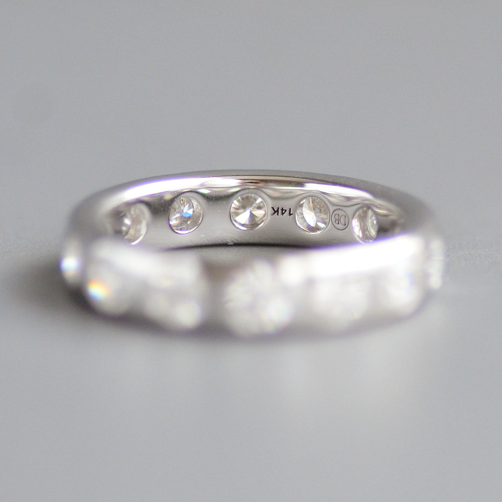 Wide round cut eternity band