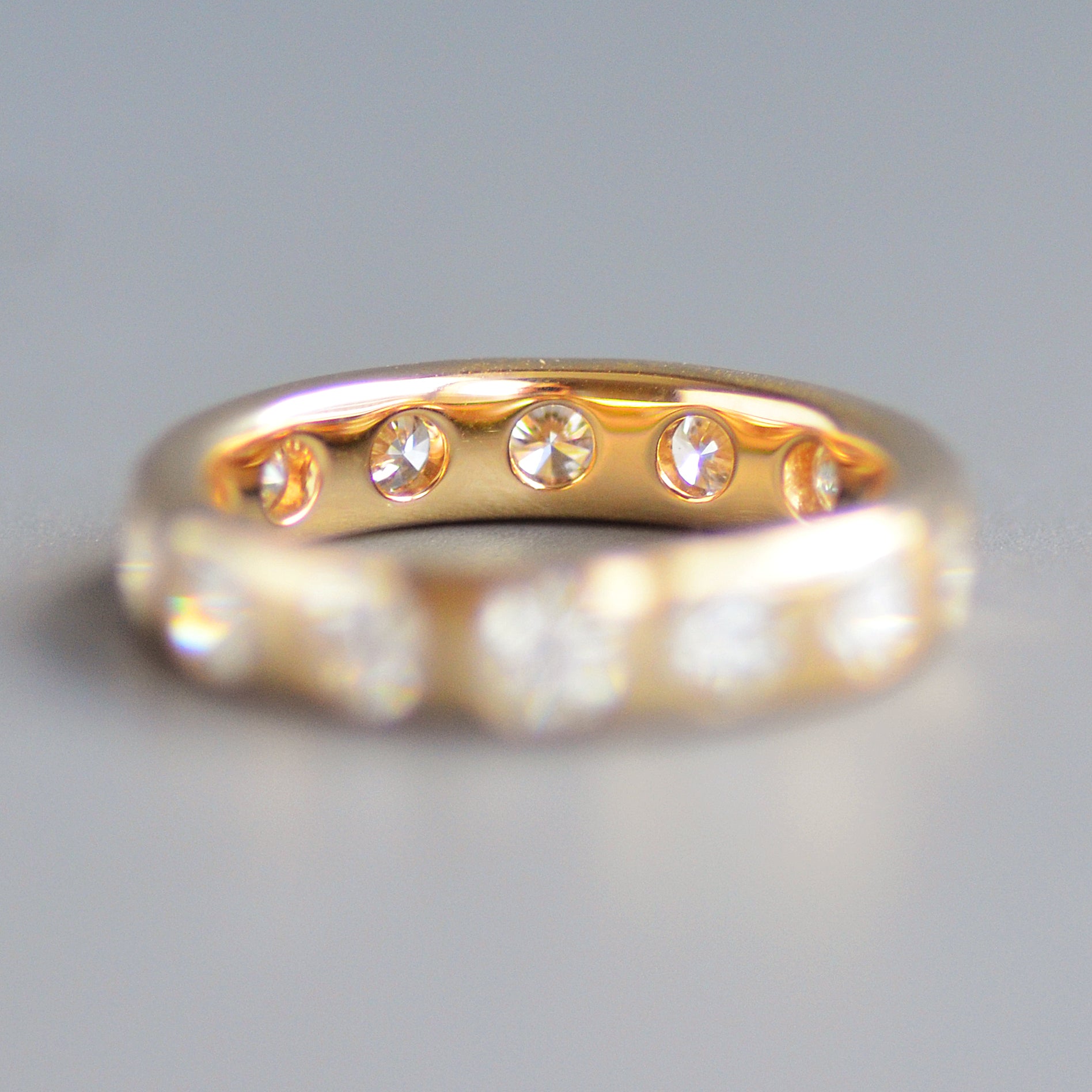 Wide round cut eternity band
