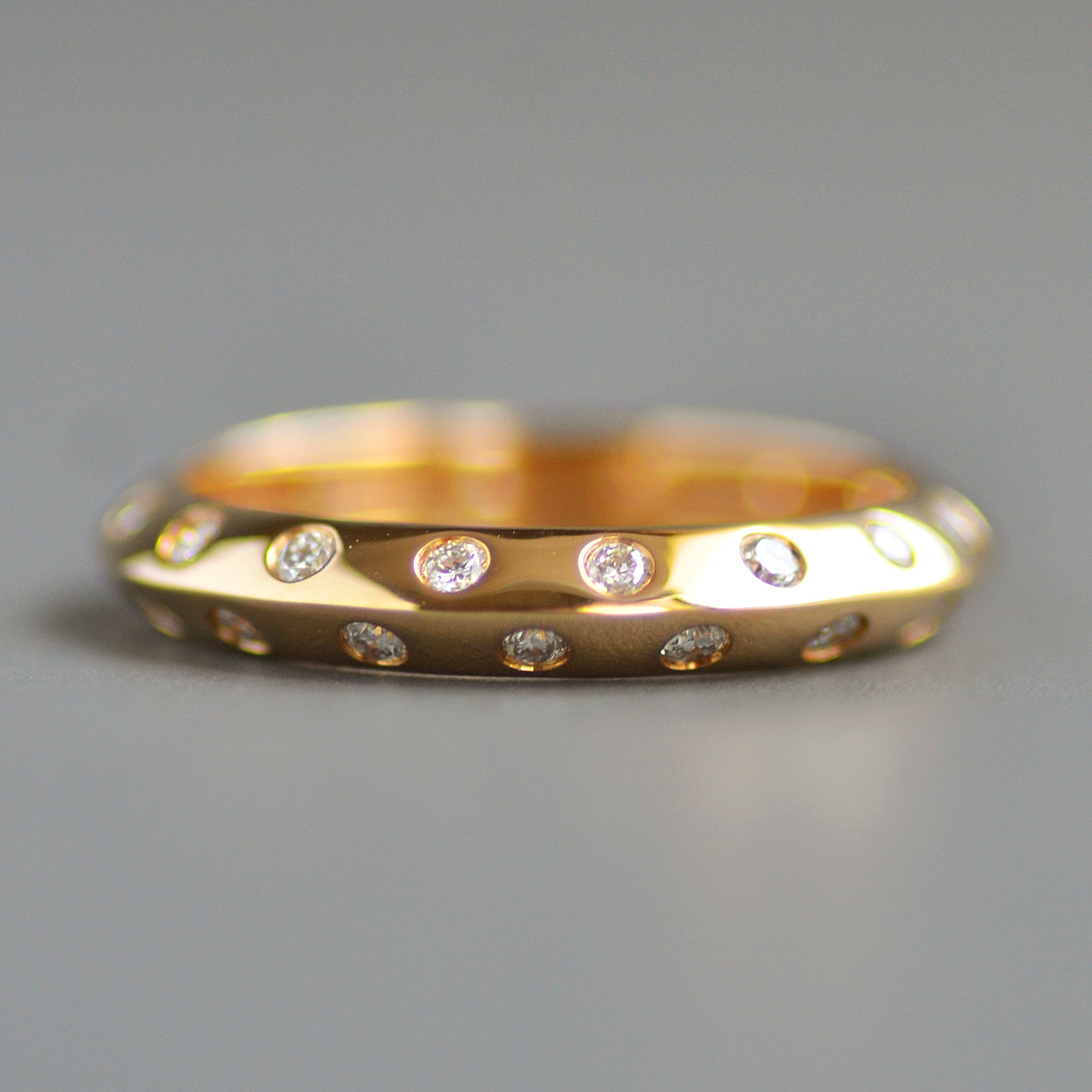 Knife edge eternity band rounds alternating