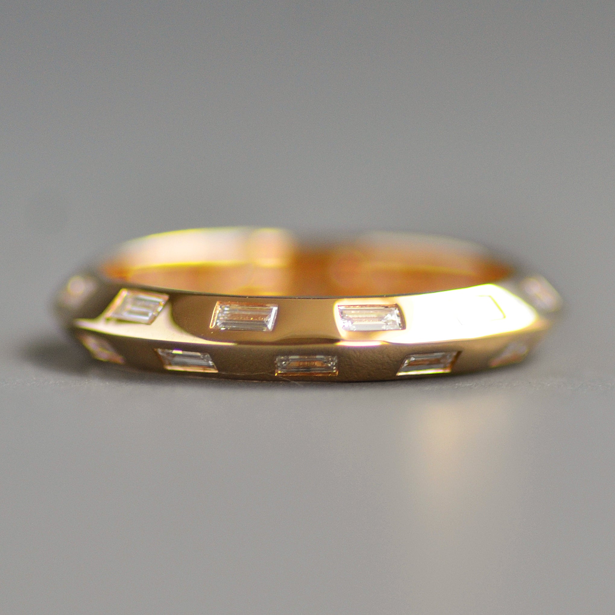 Knife edge eternity band baguettes alternating