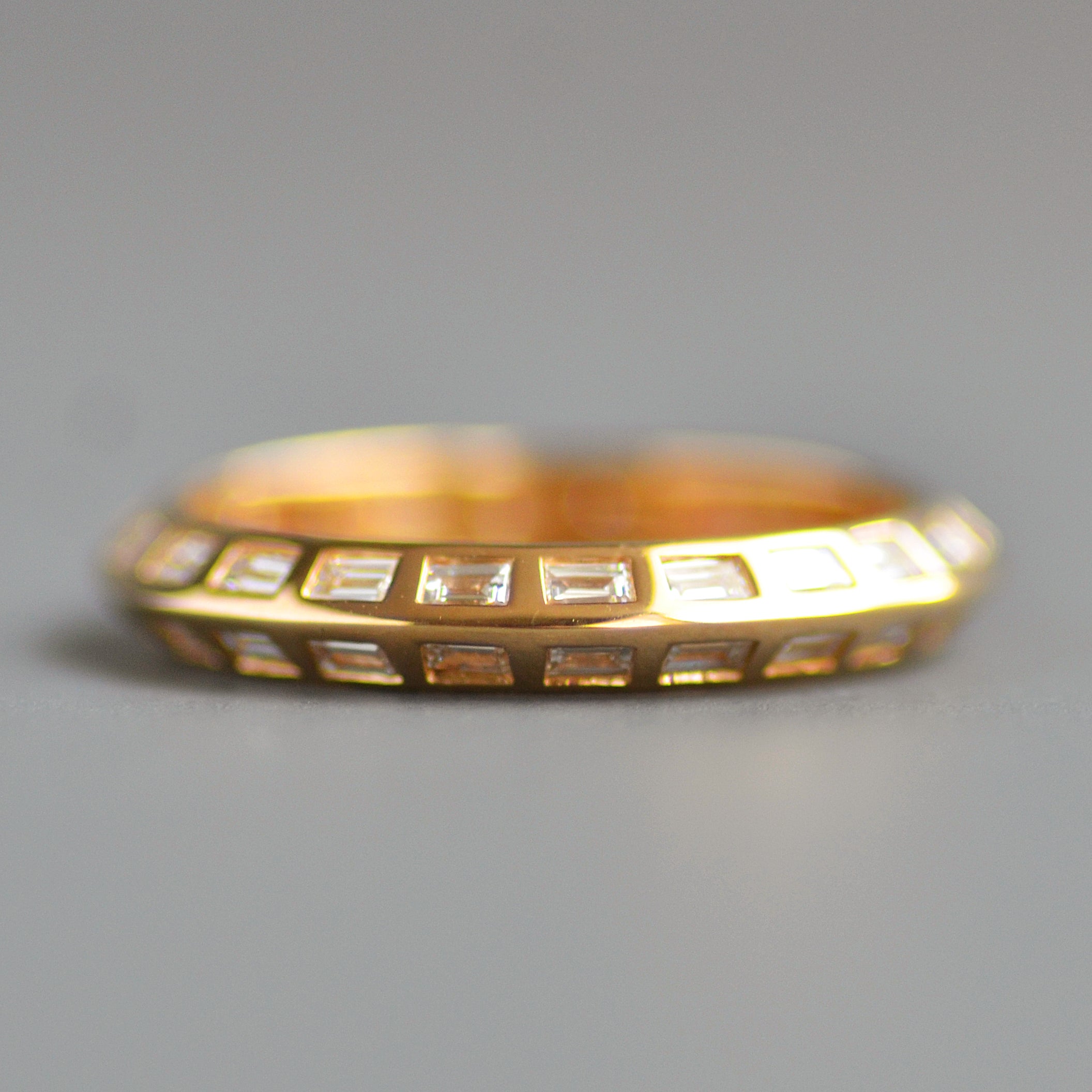 Knife edge eternity band baguettes
