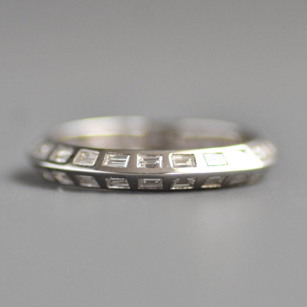 Knife edge eternity band baguettes