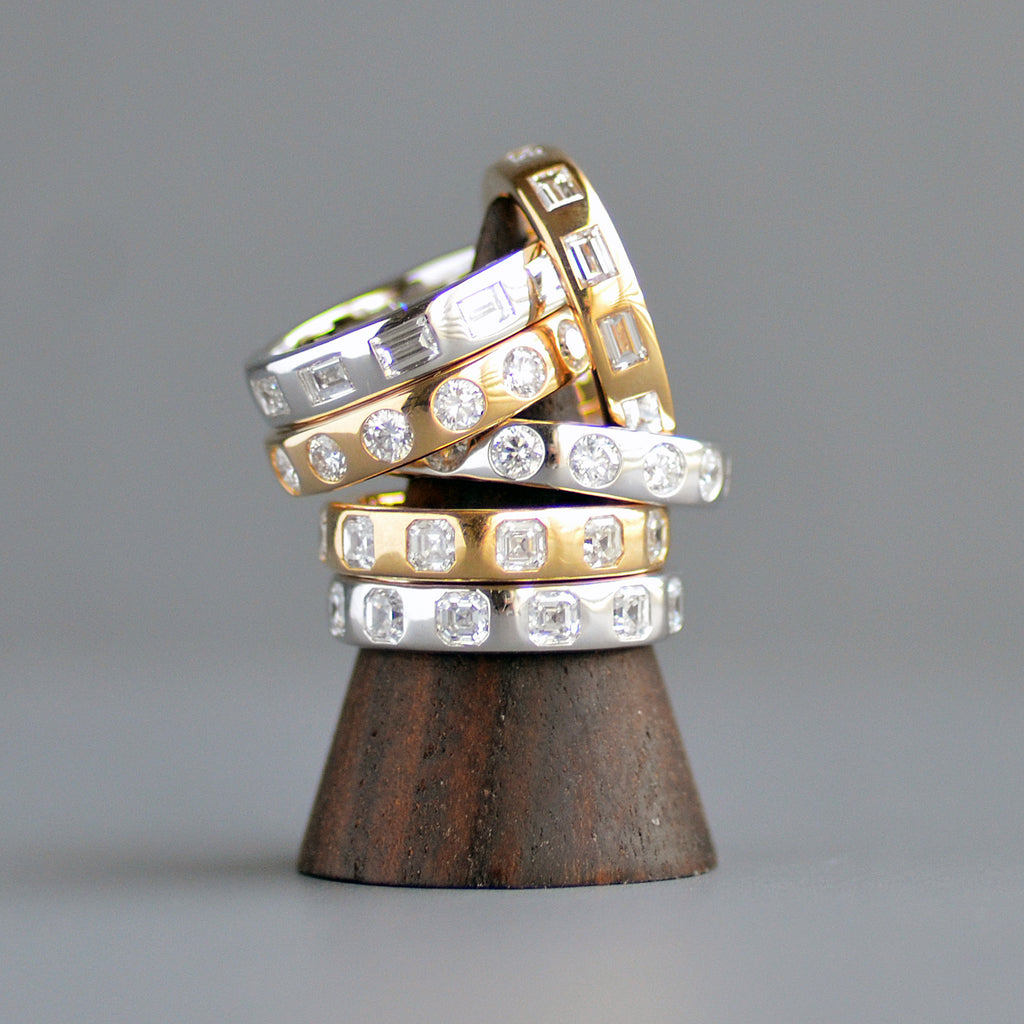 Wide emerald cut eternity band
